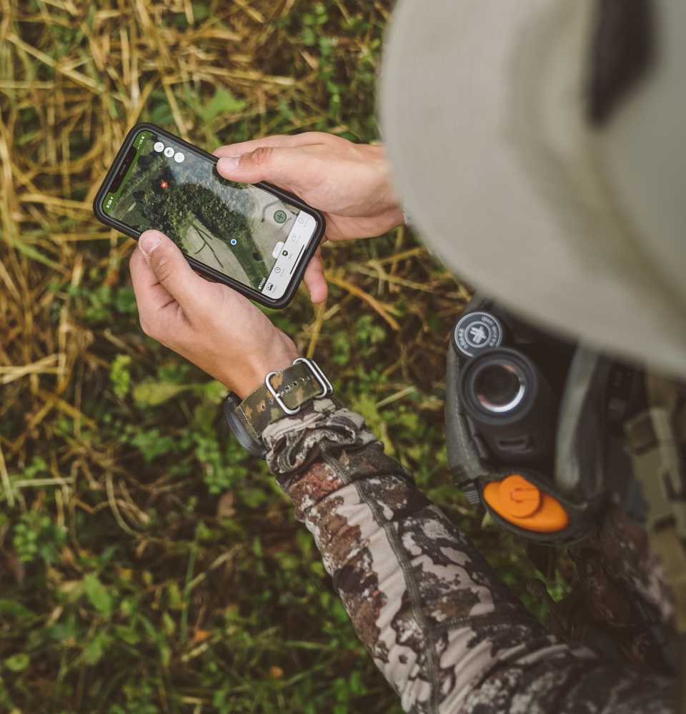 Quick Camera Bag Strapped To Back Of Hunter